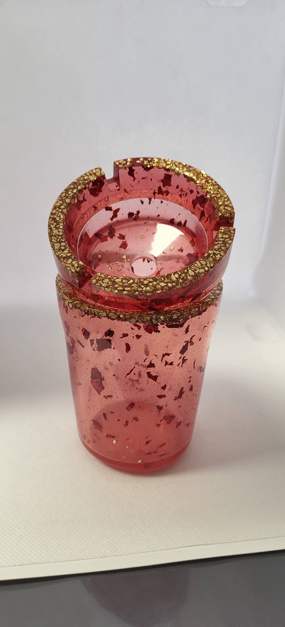 Cendrier avec réservoir